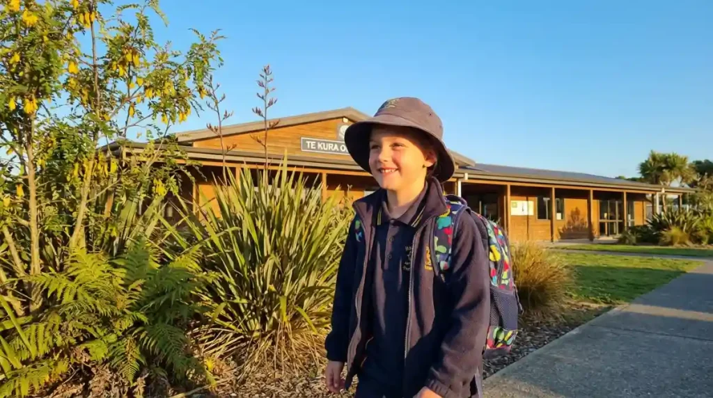 Happy school-age child in New Zealand